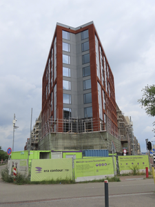 908219 Gezicht op de kop van de nieuwe appartementengebouwen 'Buur', tussen de Grauwaartsingel (links) en de ...